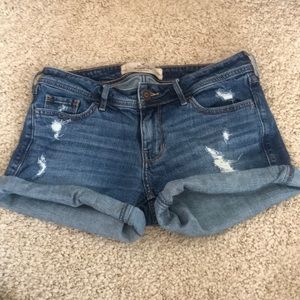 Distressed denim shorts